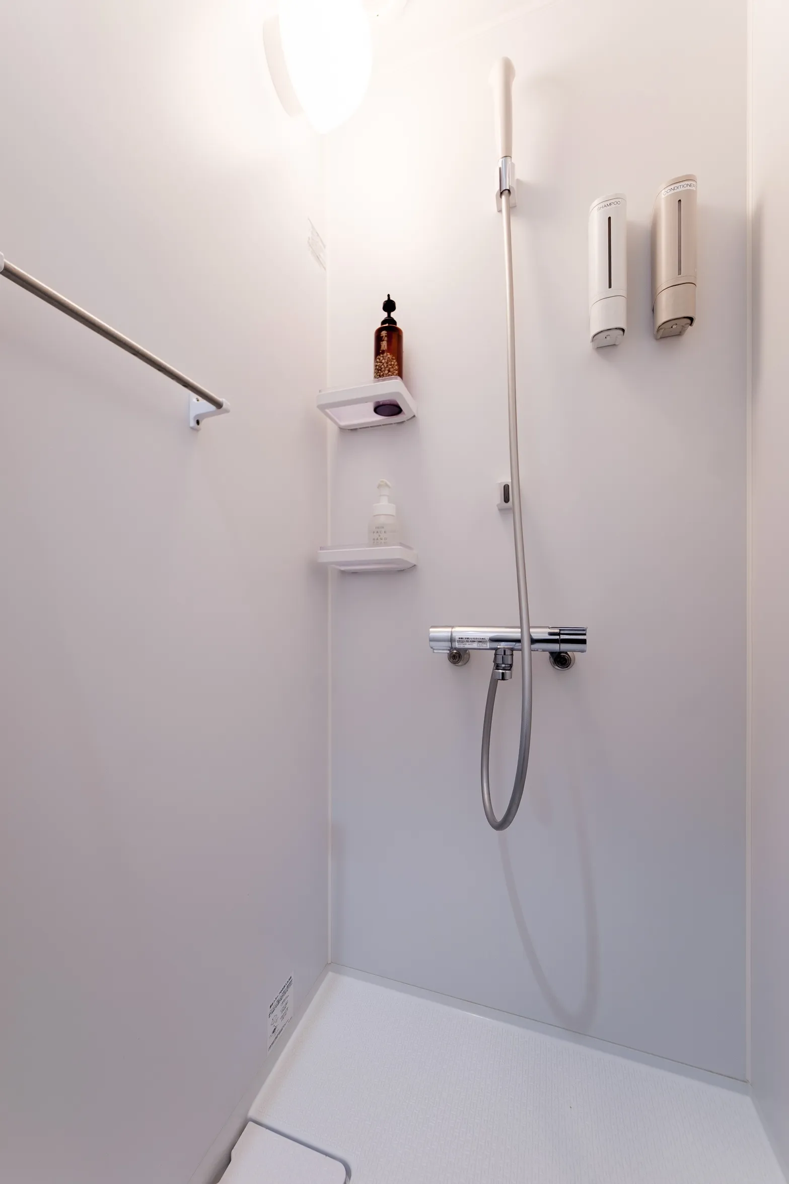 Private shower room available on each floor at Hostel JAZ
