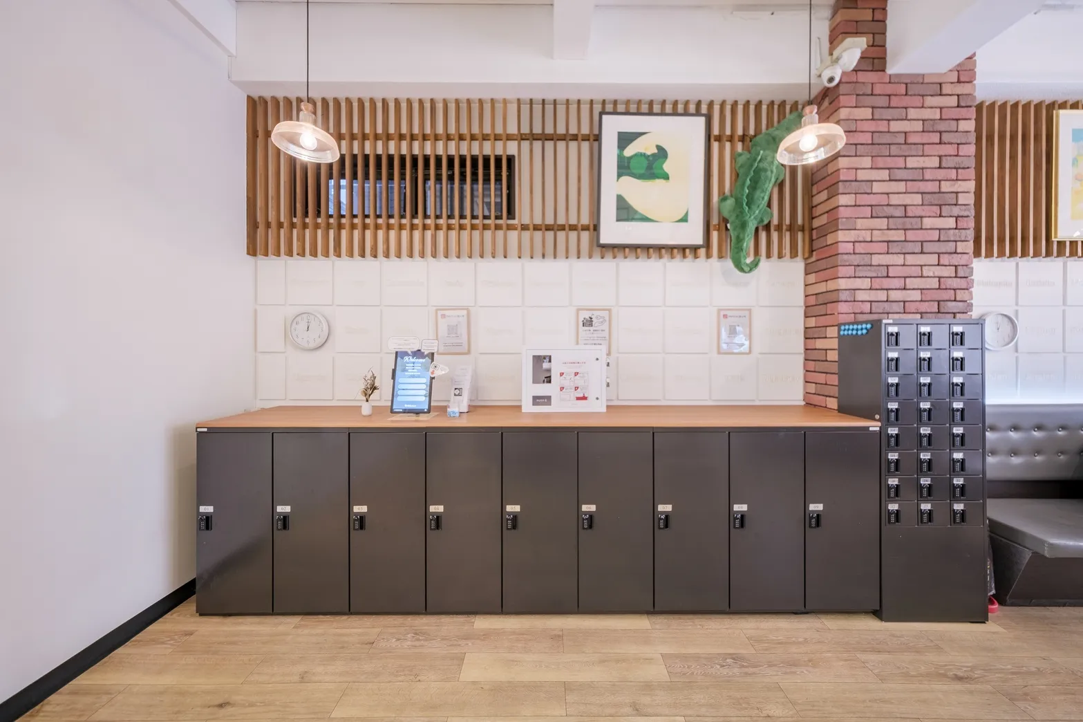 Reception desk and front entrance at Hostel JAZ Ueno Tokyo